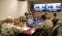 Personnel from the U.S. Army South Security Cooperation Division, listen in during the Central America Working Group virtual meeting