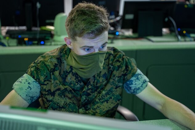A U.S. Marine monitors network activity from the operations floor at Marine Corps Base Quantico, Va., Aug. 31.