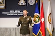 Col. Derek Bird addresses PEO Soldier staff, leadership and his family after being chartered as Project Manager, Soldier Survivability at Fort Belvoir, Va., August 21, 2020.