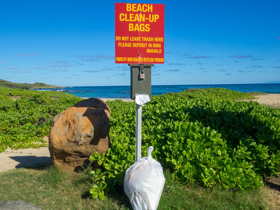 Beach Clean-up Bag stations near MCBH beach entries help keep our beaches beautiful.  Bag stations managed by the Base Qualified Recycling Program encourage beachgoers to pick up debris, take it away and dispose of in a rubbish bin.  This helps prevent pollution and keeps the ocean and our beaches clean.