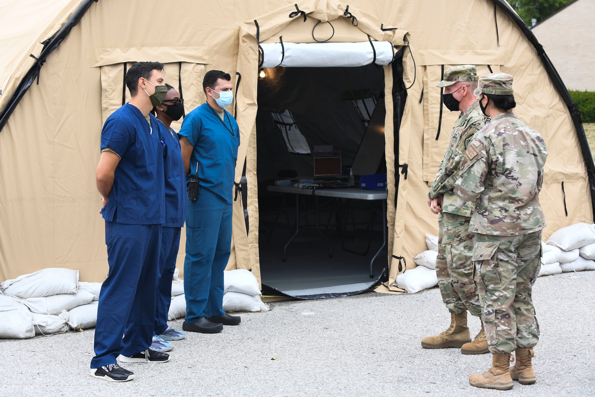 Airmen from the 55th Medical Group speak with Gen. Stephen Wilson, Vice Chief of Staff of the Air Force, at Offutt Air Force Base, Neb., Sept. 1, 2020. Wilson spoke with Airmen and received an update on COVID-19 response and flood recovery efforts. (U.S. Air Force photo by Staff Sgt. Jessica Montano)