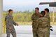U.S. Air Force Chief Master Sgt. John Lokken, the 354th Fighter Wing command chief, talks with aircraft maintainers on Eielson Air Force Base, Alaska, Aug. 28, 2020.
