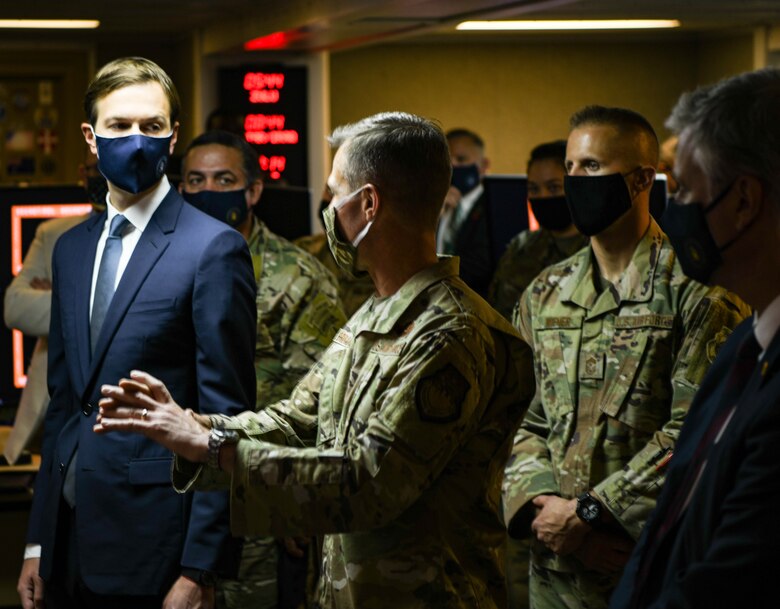 Brig. Gen. Larry Broadwell, 380th Air Expeditionary Wing commander, talks to Jared Kushner, Senior Adviser to the President of the United States, about mission capabilities in the 727th Expeditionary Air Control Squadron, September 1, 2020, at Al Dhafra Air Base, United Arab Emirates.
