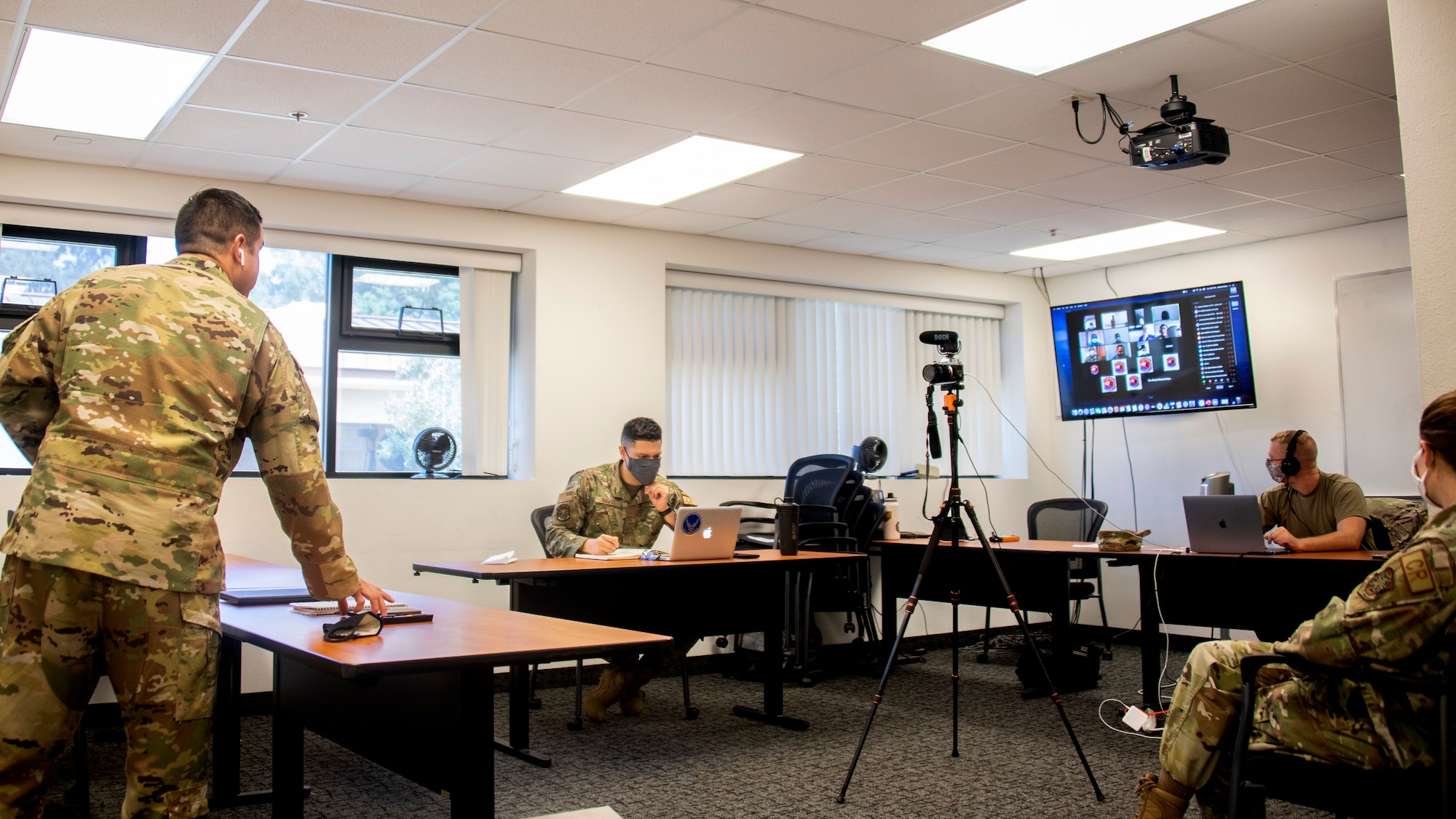 Air advisors with the 571st Mobility Support Advisory Squadron provide training to members of the National Aeronaval Service of Panama during a virtual engagement, Sept. 1, 2020, at Travis Air Force Base in California. The two-week engagement is their first time using a virtual medium to train a partner nation and consists of an introductory command and control course and a multi-topic airfield operations course. (U.S. Air Force photo by Tech. Sgt. Liliana Moreno)