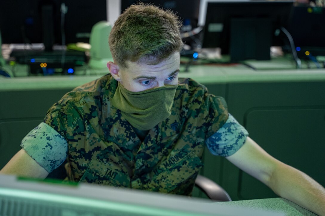 A U.S. Marine monitors network activity from the operations floor at Marine Corps Base Quantico, Va., Aug. 31.