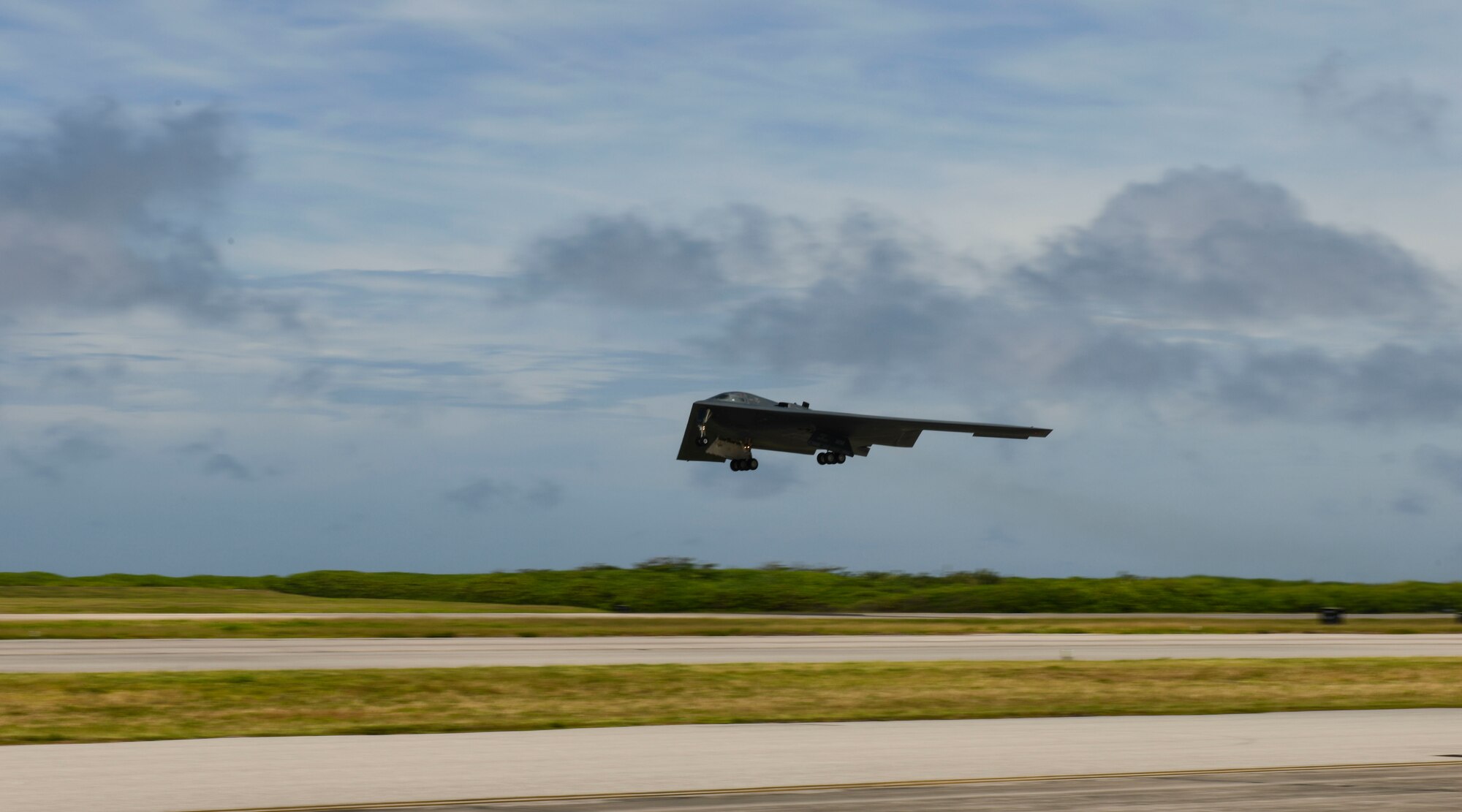 A B-2 Spirit Stealth Bomber, deployed from Whiteman Air Force Base, Missouri, takes off at Naval Support Facility Diego Garcia, in support a Bomber Task Force mission, August 26, 2020. BTF missions allow U.S. Strategic Command to provide persistent, long-term bomber presence to aid in U.S. Indo-Pacific Command’s commitment to a free and open Indo-Pacific. As part of their BTF deployment, the B-2s participated in a combined United States-Australia exercise with Marine Rotational Force-Darwin and Australian Defence Forces. During the exercise, MRF-D and ADF Joint Terminal Attack Controllers coordinated airstrikes with U.S. Air Force B-1B Lancers and B-2 Spirit Stealth Bombers. (U.S Air Force photo by Tech. Sgt. Heather Salazar)
