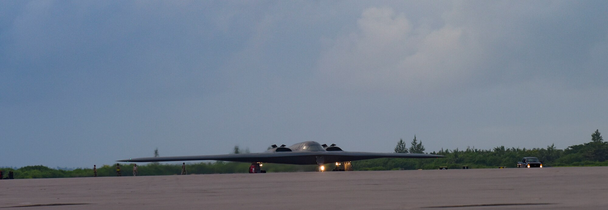 U.S. Air Force maintainers assigned to the 393rd Expeditionary Bomb Squadron, Whiteman Air Force Base, Missouri, taxi in the B-2 Spirit Stealth Bomber at Naval Support Facility Diego Garcia, to support a Bomber Task Force mission, Aug. 14, 2020.  As part of their BTF deployment, the B-2s participated in a combined United States-Australia exercise with Marine Rotational Force -Darwin and Australian Defence Forces. During the exercise, MRF-D and ADF Joint Terminal Attack Controllers coordinated airstrikes with U.S. Air Force B-1B Lancers and B-2 Spirit Stealth Bombers. (U.S. Air Force photo by Senior Airman Alexandria Lee)
