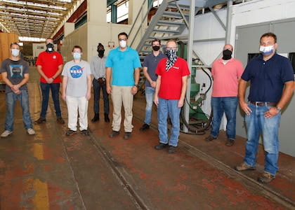 The NNSY Mechanical Group (Code 930) Cold Spray Team, along with other team members throughout the shipyard,