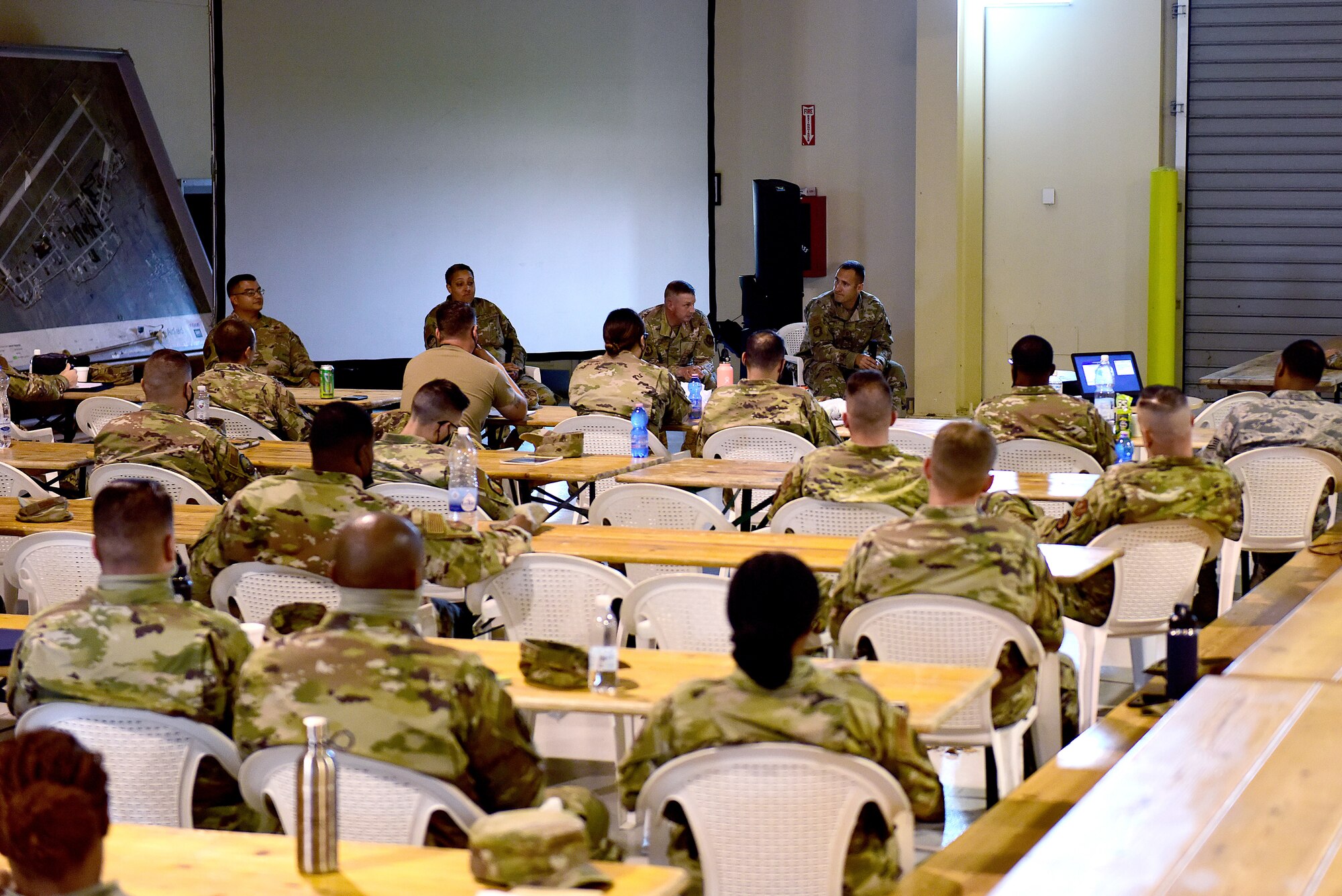 A panel of first sergeants speaks with attendees of a First Sergeant Symposium at Aviano Air Base, Italy, Sept. 1, 2020. Nearly 77 Airmen of both enlisted and officer ranks attended the four-day course aimed at providing information to aspiring first sergeants. (U.S. Air Force photo by Staff Sgt. Kelsey Owen)