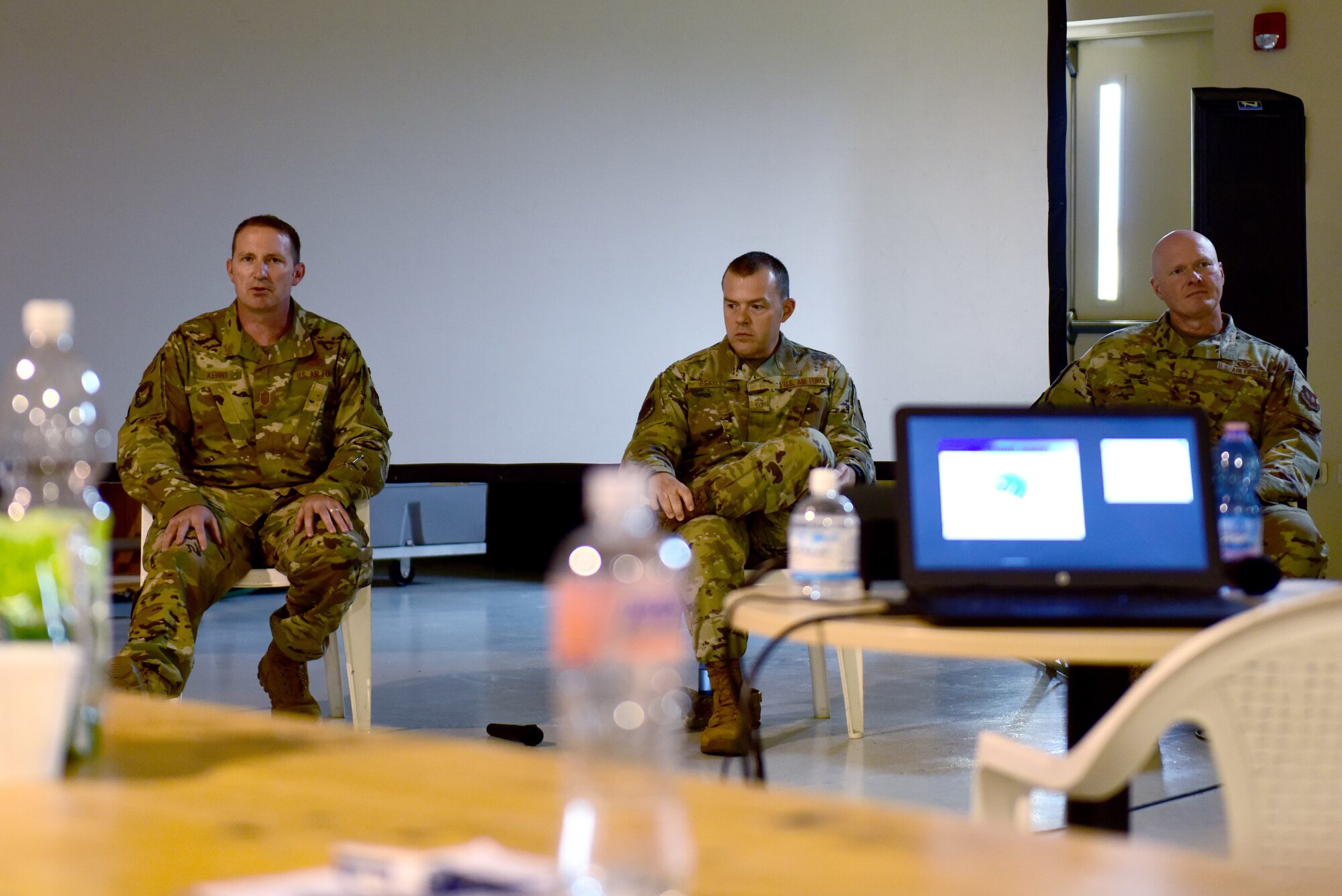 A panel of chief master sergeants speaks with attendees of a First Sergeant Symposium Aviano Air Base, Italy, Sept. 1, 2020. The course included panels of first sergeants and chief master sergeants, as well as briefings from on-base agencies such as the Airman & Family Readiness Center and the Equal Opportunity office. (U.S. Air Force photo by Staff Sgt. Kelsey Owen)