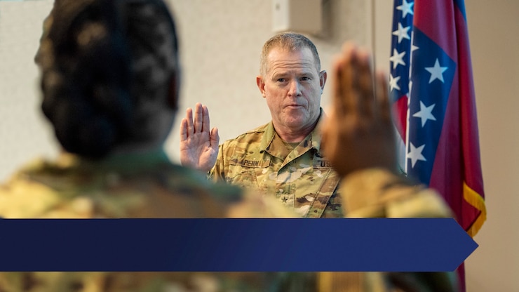 MG Kendall Penn administers the Oath to an Airman in the 189th Airlift Wing