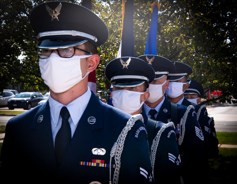 Airmen from the High Frontier Honor Guard prepare to post the colors during their graduation ceremony Sept. 1, 2020, at Peterson Air Force Base, Colorado. This is the second graduation of the year for the High Frontier Honor Guard. The unit usually has three graduations each year, but moved to two because of the COVID-19 pandemic. (U.S. Air Force photo by Airman 1st Class Jonathan Whitely)