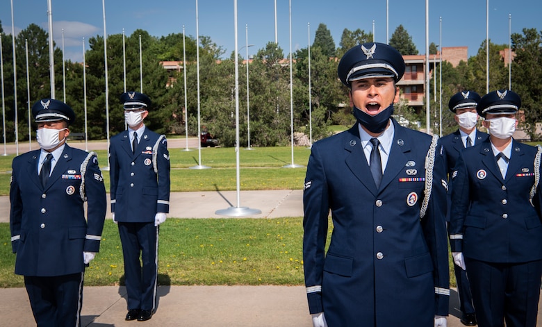 Airman 1st Class Cesar Chavez-Soto, High Frontier Honor Guard flight 20A flight lead, leads the graduates of flight 20B in the Honor Guard charge Sept. 1, 2020, at Peterson Air Force Base, Colorado. Despite the hardships 2020 has brought, the unit stays busy. In 2019, the High Frontier Honor Guard performed 473 services, 280 of those being funerals, with numbers projected to be similar at the end of this year. (U.S. Air Force photo by Airman 1st Class Jonathan Whitely)