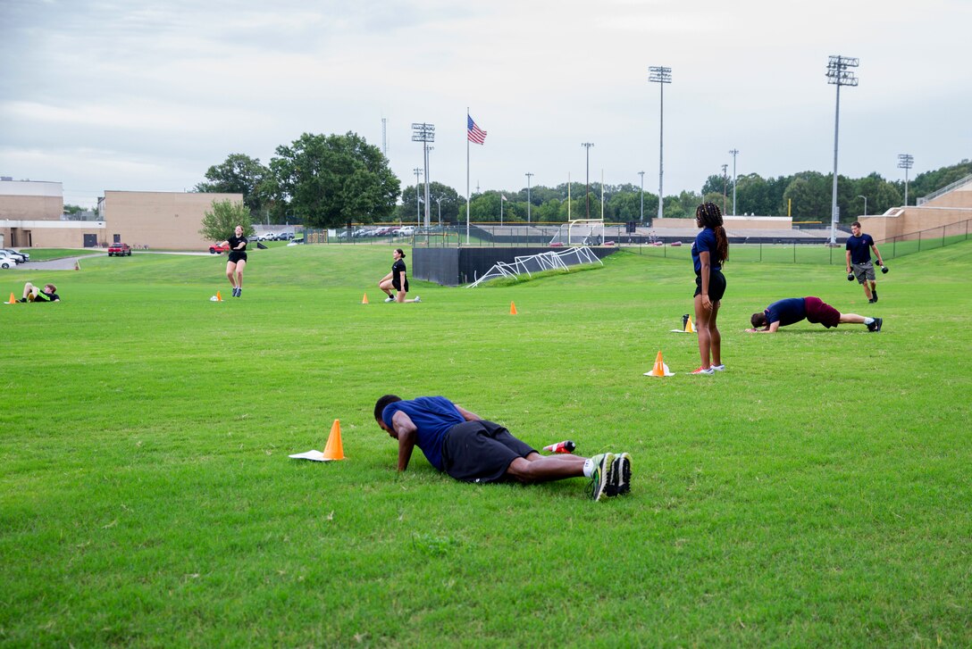 The poolees of Permanent Contact Station Dyersburg participate in a semi-weekly physical training session at Dyersburg High School, Dyersburg, Tennessee, Aug. 27, 2020.  Poolees participate in physical training with the recruiters to ensure they are prepared to endure the challenges of Marine Corps recruit training.
