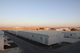 The moon rises on a quarantine site where cohorts are separated for two weeks and screened for symptoms daily. This quarantine site quarantines service members coming from other areas in the region.