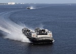 The Navy’s newest Landing Craft Air Cushion (LCAC) hovercraft arrived at Naval Surface Warfare Center Panama City Division Sept. 2. The two craft, LCAC-100 and LCAC-101, were escorted by NSWC PCD’s research, development, test and evaluation craft, LCAC-91.This effort is part of the Navy’s Ship to Shore Connector program which calls for the procurement of 72 craft with a separate craft serving as a test and training craft.