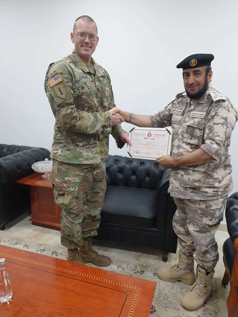 Capt. Allen Paul Jordan, the West Virginia National Guard’s State Partnership Program – Qatar bilateral affairs officer, poses for a photo with Qatari Brig. Gen. Sultan Mohammed Sultan Al Shawani, multilingual school commander, following his graduation. Allen took part in a  3-week basic Arabic course offered at the Qatar Armed Forces Language Institute in Al Sheehaniya, Qatar. (Courtesy photo)