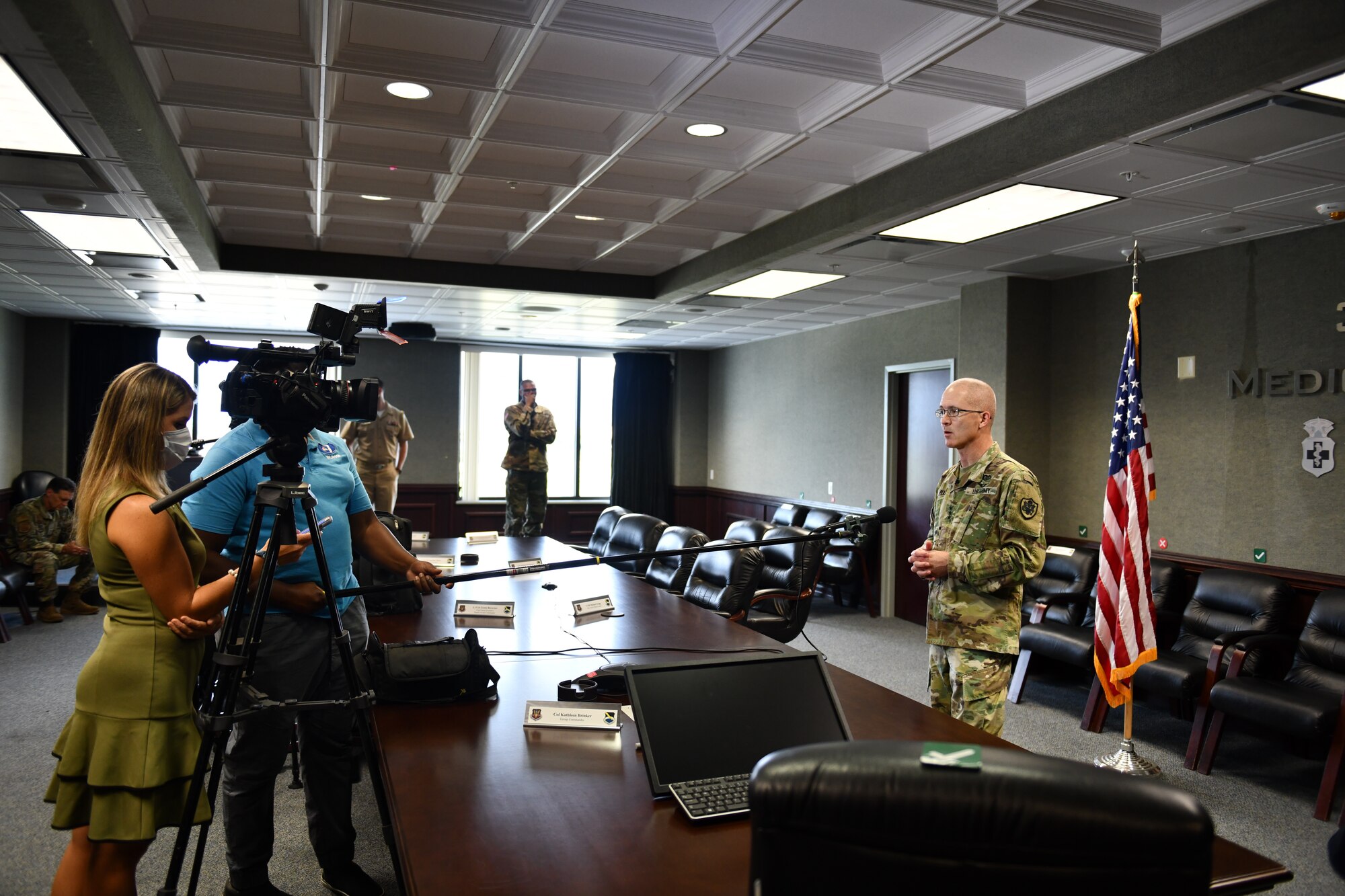 U.S. Army Lt. Gen. Ronald J. Place (middle), Defense Health Agency director, answers questions from local news stations at Tyndall Air Force Base, Florida, Aug. 31, 2020. Place toured Tyndall and spoke with local media regarding future changes to DHA programs and policies (U.S. Air Force photo by Senior Airman Stefan Alvarez)
