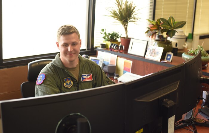 Man sits at desk