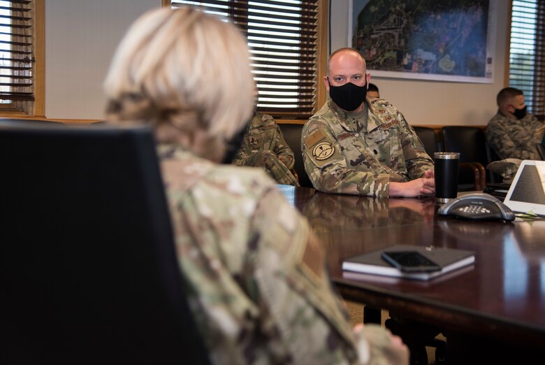 U.S. Air Force Lt. Col. Christopher Schnipke, 673d Civil Engineer Squadron commander, briefs U.S. Air Force Col. Kirsten Aguilar, Joint Base Elmendorf-Richardson and 673d Air Base Wing commander, during an immersion tour at JBER, Alaska, Aug. 28, 2020. Aguilar’s tour focused on the 673d CES Airmen and their role in supporting the joint base partnership on the installation.