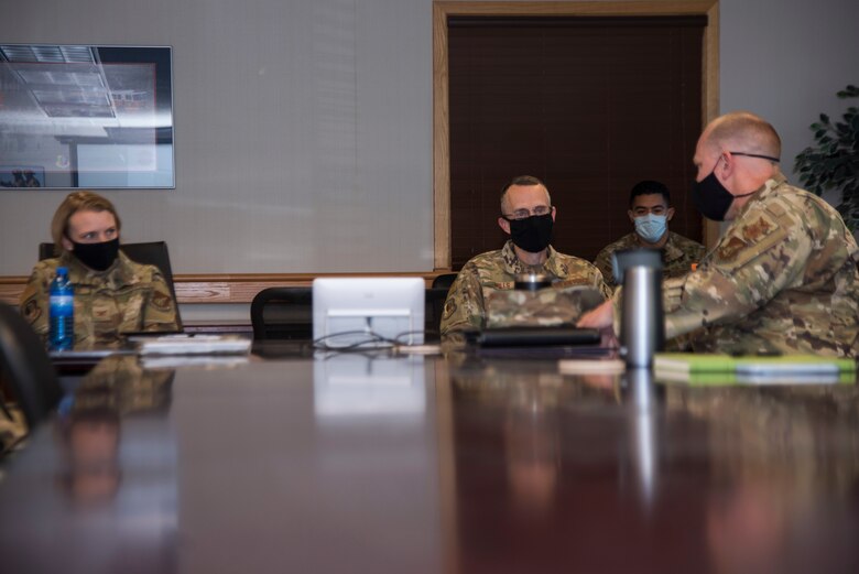 From right, U.S. Air Force Lt. Col. Christopher Schnipke, 673d Civil Engineer Squadron commander, briefs U.S. Air Force Chief Master Sgt. Lee Mills, 673d Air Base Wing command chief, and U.S. Air Force Col. Kirsten Aguilar, JBER and 673d ABW commander, during an immersion tour at Joint Base Elmendorf-Richardson, Alaska, Aug. 28, 2020. Aguilar’s tour was focused on the 673d CES Airmen and their role in supporting the joint base partnership on the installation.