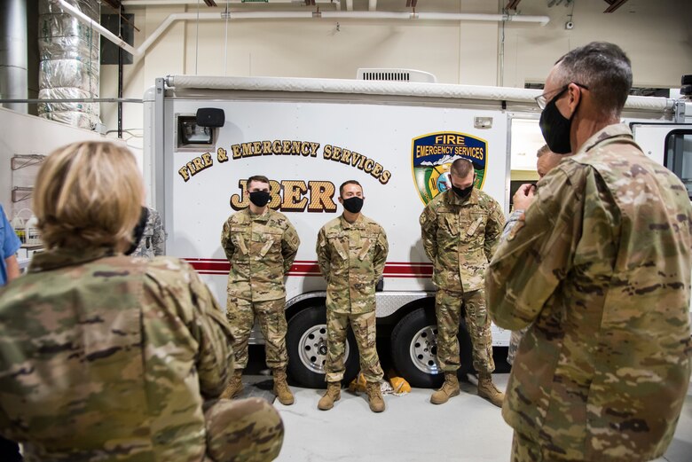 U.S. Air Force Col. Kirsten Aguilar, Joint Base Elmendorf-Richardson and 673d Air Base Wing commander, and U.S. Air Force Chief Master Sgt. Lee Mills, 673d ABW command chief participate in an immersion tour at the 673d Civil Engineer Squadron at JBER, Alaska, Aug. 28, 2020. Aguilar’s tour focused on the 673d CES Airmen and their role in supporting the joint base partnership on the installation.