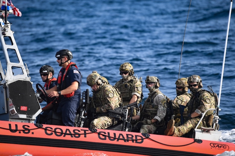 U.S. Coast Guardsmen from the Maritime Security Response Team East patrol in support of Advanced Battle Management System Onramp 2 in the Gulf of Mexico, Sept. 1, 2020. ABMS is an interconnected battle network - the digital architecture or foundation - which collects, processes and shares data relevant to warfighters in order to make better decisions faster. In order to achieve all-domain superiority, it requires that individual military activities not simply be de-conflicted, but rather integrated - activities in one domain must enhance the effectiveness of those in another domain. (U.S. Air Force photo by Staff Sgt. Haley Phillips)