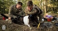 Sgt. Nicholas Taussig, left, and Sgt. Michael Johnson treat a simulated military working dog casualty during the CSM Jack L. Clark Jr. Army Best Medic Competition at Joint Base Lewis-McChord, Washington, Sept. 24, 2019.

Twenty-eight two-Soldier teams from all around the world traveled to Washington state to compete in the finals to be named the Army’s Best Medic. The competition is a 72-hour arduous test of the teams’ physical and mental skills. Competitors must be agile, adaptive leaders who demonstrate mature judgement while testing collective team skills in areas of physical fitness, tactical marksmanship, leadership, warrior skills, land navigation and overall knowledge of medical, technical and tactical proficiencies through a series of hands-on tasks in a simulated operational environment.

(U.S. Army photo illustration by John Wayne Liston/Released)