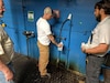 Michael Brown, Public Health Command-Pacific senior environmental engineer, collects a treated water sample from the water treatment plant at Fort Polk, La., April 9, 2019. The sample was analyzed for multiple contaminants that contribute to drinking water discoloration at the Army Public Health Center laboratory. (U.S. Army photo by Capt. Charles Bateman)