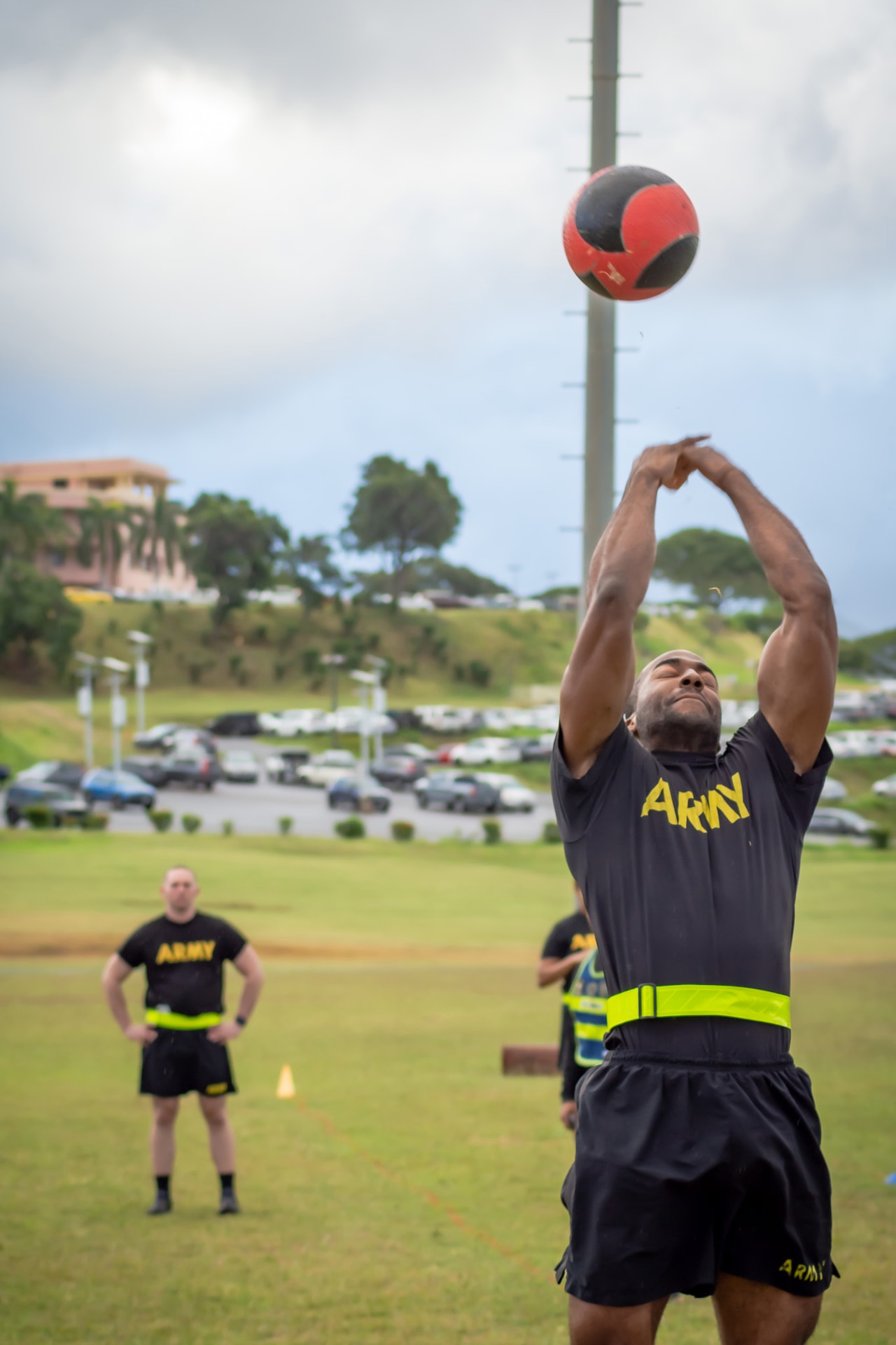 Sgt. Adam Tucker, Public Health Activity – Guam food inspector, throws a ball over his head during the standing power throw event of the Army Combat Fitness Test at Tripler Army Medical Center, Hawaii, March 2, 2019. This week, Public Health Command – Pacific and Dental Health Command – Pacific are holding their Best Warrior Competitions together. Some of the specific tasks Soldiers will complete this week include: an Army Combat Fitness Test assessment, a land navigation course, Army Warrior tasks, an obstacle course, a formal board interview, and a mystery event. The PHC-P winners will be announced Friday during an award ceremony. (U.S. Army photo by 1st Sgt. Christopher Harris)