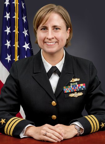 IMAGE: DAHLGREN, Va. - Navy Cmdr. Sarah Rice was the keynote speaker at the Naval Surface Warfare Center Dahlgren Division Women’s Equality Day observance, Aug. 26. Rice recounted the history and impact of women suffrage activists while speaking on the 2020 theme for national Women’s History Month theme: Chipping Away at Inequality - Honoring the Past, Securing the Future. “I can’t stress enough that women have worked so hard to get the right to vote – and then to get the right for everyone to vote – before and after 1920,” said Rice, a project manager with the Naval Sea Systems Command Program Executive Office for Integrated Warfare Systems, during the livestream broadcast. “It’s never been more crucial than now to exercise your right to vote in the fall so do all that you can in order to do that and to enable others to do that. It’s really our privilege to be able to vote in our democracy. In addition to voting, I think it’s important to exercise your voice. Your voice is valuable and your voice deserves to be heard.”