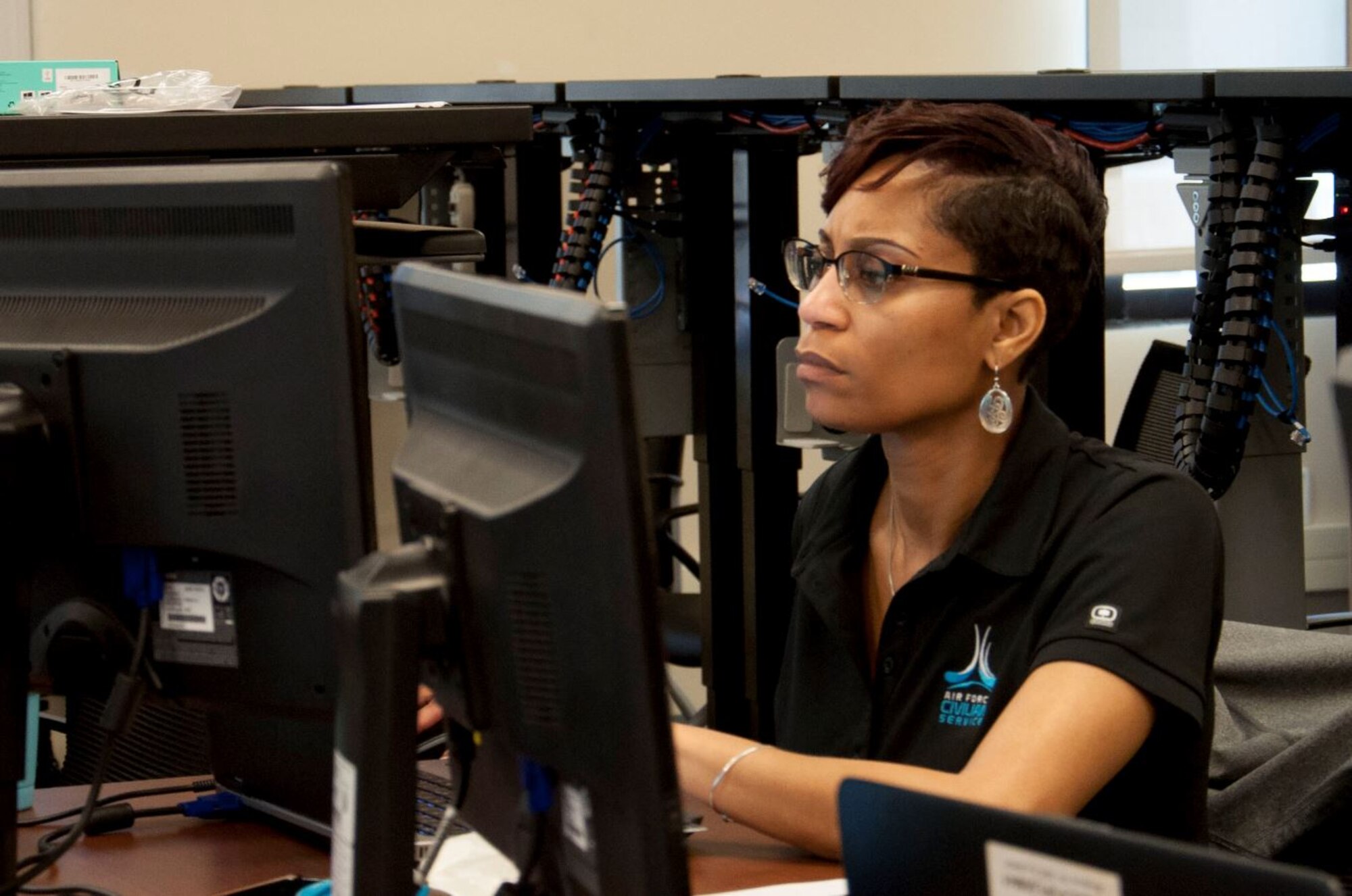 Lakisha Robertson, an Air Force Civilian Service Talent Acquisition consultant, chats with candidates virtually during a hiring event in 2019. To fill program manager positions at Hanscom Air Force Base, Mass., the Air Force Life Cycle Management Center is hosting a digital hiring event Sept. 16 and 17