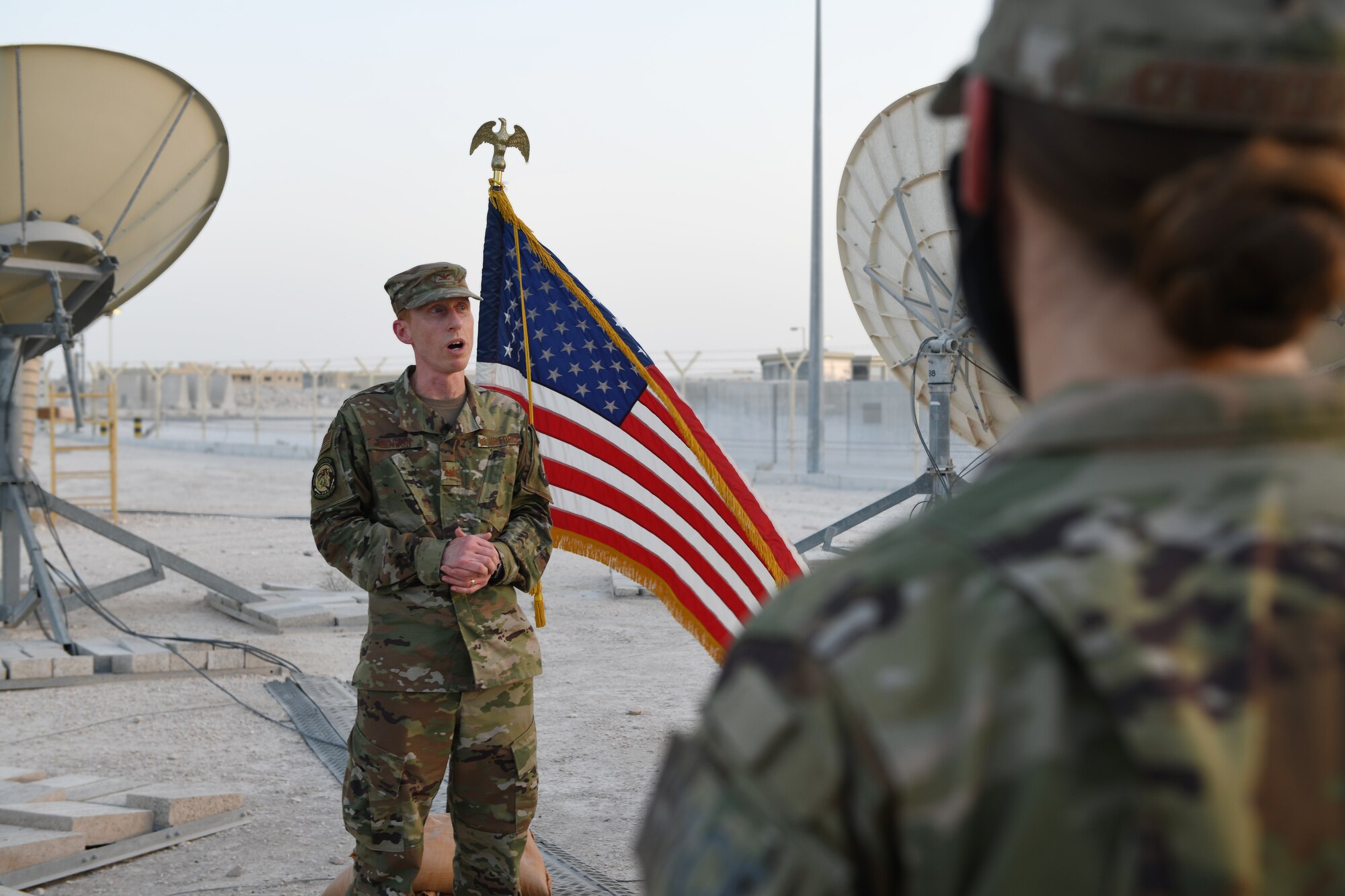Col. Todd Benson, the U.S. Air Forces Central Command director of space forces, addresses members of the 379th Operations Support Squadron before they swore in as members of the Space Force at Al Udeid Air Base, Qatar, on Sept. 1, 2020. The Space Force is the United States' newest service in more than 70 years. (U.S. Air Force photo by Staff Sgt. Kayla White)