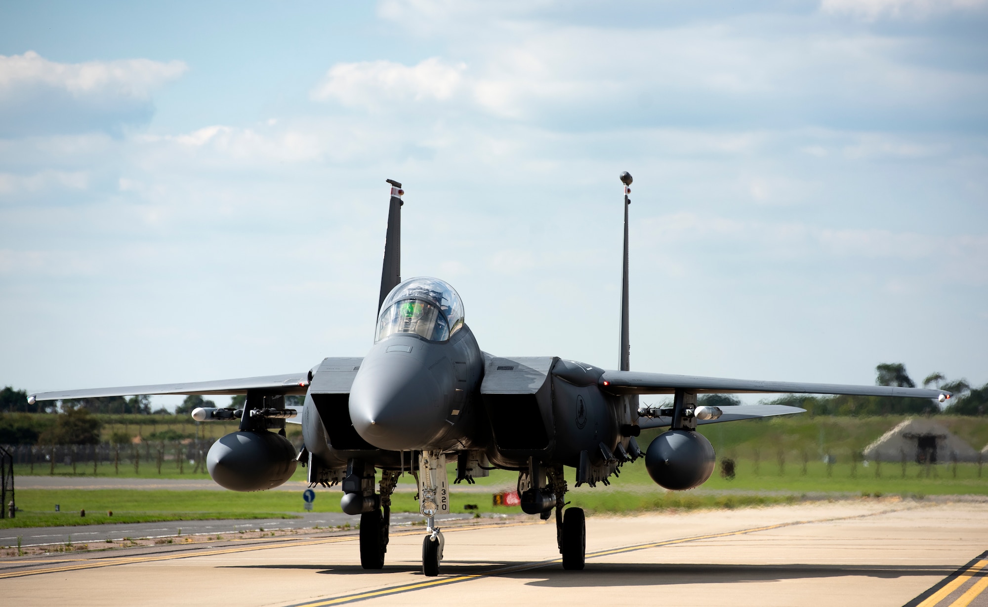 A U.S. Air Force F-15E Strike Eagle, assigned to the 494th Fighter Squadron, taxis down the flightline after a training sortie at Royal Air Force Lakenheath, England, Sept. 1, 2020. The 48th Fighter Wing conducts routine training in order to maintain combat readiness and safeguard U.S. national interests and the collective defense of allies and partners. (U.S. Air Force phtot by Airman 1st Class Jessi Monte)