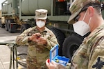 Louisiana National Guard members with A Company, 199th Brigade Support Battalion, 256th Infantry Brigade Combat Team, are providing and maintaining clean, potable water Sept. 2, 2020, to volunteers in Lake Charles, Louisiana, who are helping clean up damage caused by Hurricane Laura.