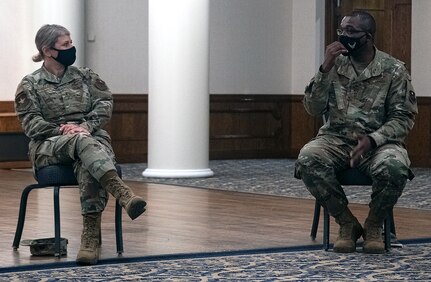 Brig. Gen. Caroline Miller, 50n2d Air Base Wing and JBSA wing commander, and Command Chief Master Sgt. Wendell Snider talk about forms of “Unconscious Bias” during the command team’s Tough Conversation Roundtable at Joint Base San Antonio-Randolph Aug. 25.