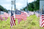 Volunteers placed 660 American flags under the New Jersey National Guard177th Fighter Wing's billboard Sept. 1, 2020, to represent the approximate number of veterans that commit suicide every month in the United States. September is Suicide Awareness Month.