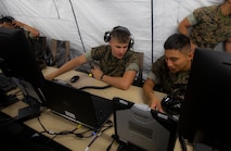 U.S. Marines with Marine Air Support Squadron 2 conduct New Equipment Training with Phase II of the Common Aviation Command and Control System aboard Marine Corps Air Station Futenma, Okinawa, Japan, Sept. 19, 2019. CAC2S modernizes aviation command and control equipment and improves interoperability among Marine Air Command and Control squadrons, Marine Air-Ground Task Force assets and joint agencies. Program Executive Officer Land Systems recently completed fielding all full rate production units of CAC2S. (U.S. Marine Corps photo by Lance Cpl. Ethan M. LeBlanc)