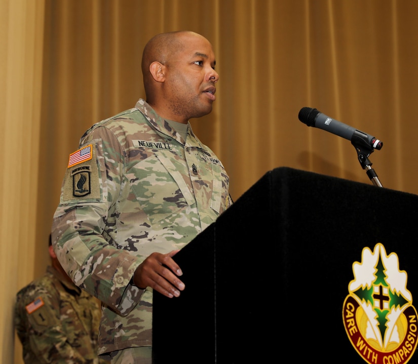 Command Sgt. Maj. Abuoh Neufville, command sergeant major of Regional Health Command-Pacific, speaks at the NCO induction ceremony at Joint Base Lewis-McChord, Wash., Aug. 7, 2020. (Photo Credit: Christopher Larsen)