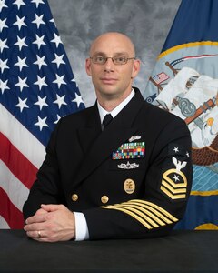 Official portrait Master Chief Damien A. Pulvino, command master chief, Naval Computer and Telecommunications Station (NCTS) Yokosuka, Japan,