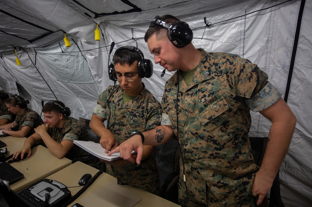 U.S. Marines with Marine Air Support Squadron 2 conduct New Equipment Training with Phase II of the Common Aviation Command and Control System aboard Marine Corps Air Station Futenma, Okinawa, Japan, Sept. 19, 2019. CAC2S modernizes aviation command and control equipment and improves interoperability among Marine Air Command and Control squadrons, Marine Air-Ground Task Force assets and joint agencies. Program Executive Officer Land Systems recently completed fielding all full rate production units of CAC2S.  (U.S. Marine Corps photo by Lance Cpl. Ethan M. LeBlanc)