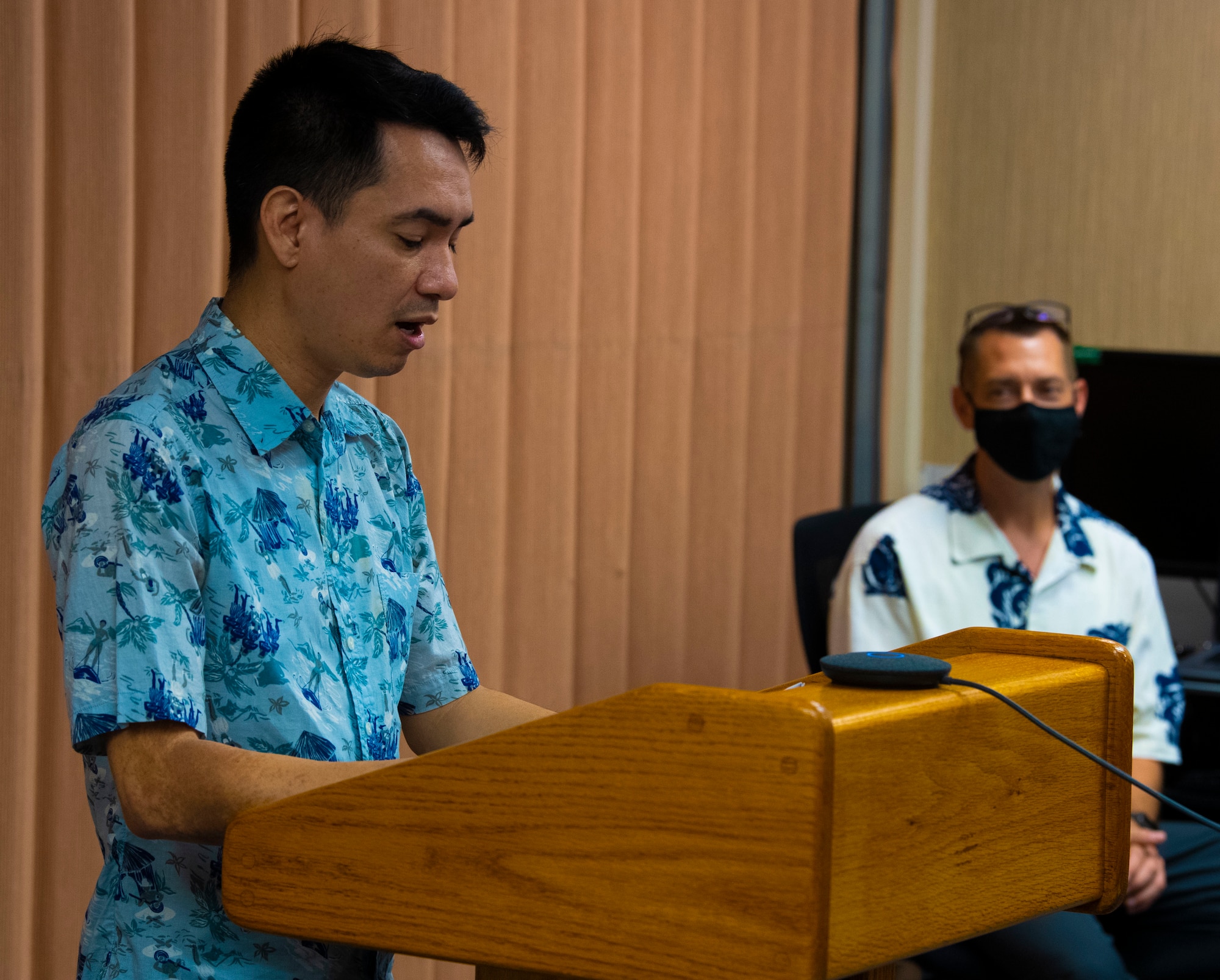 A photo of U.S. Air Force Senior Master Sgt. Andre Valentine, 624th Regional Support Group Yellow Ribbon Program coordinator, welcoming Reserve Citizen Airmen during a Yellow Ribbon predeployment event held at the 48th Aerial Port Squadron at Joint Base Pearl Harbor Hickam, Hawaii, Aug. 29, 2020.