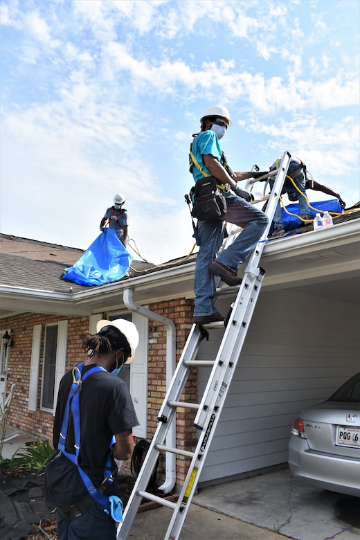 U.S. Army Corps of Engineers contractors in Lake Charles, Louisiana, installed reinforced plastic sheeting today, Sept. 5,  for the first home to benefit from Operation Blue Roof since Hurricane Laura. The program, managed by the U.S. Army Corps of Engineers for the FEMA Federal Emergency Management Agency, reduces further damage to property until permanent repairs can be made. This is a free service to homeowners. Parties affected by Hurricane Laura are encouraged to submit a Right-of-Entry application. To learn more about Operation Blue Roof and to apply, visit: https://www.usace.army.mil/BlueRoof/  (USACE Photos by Jessica Haas)