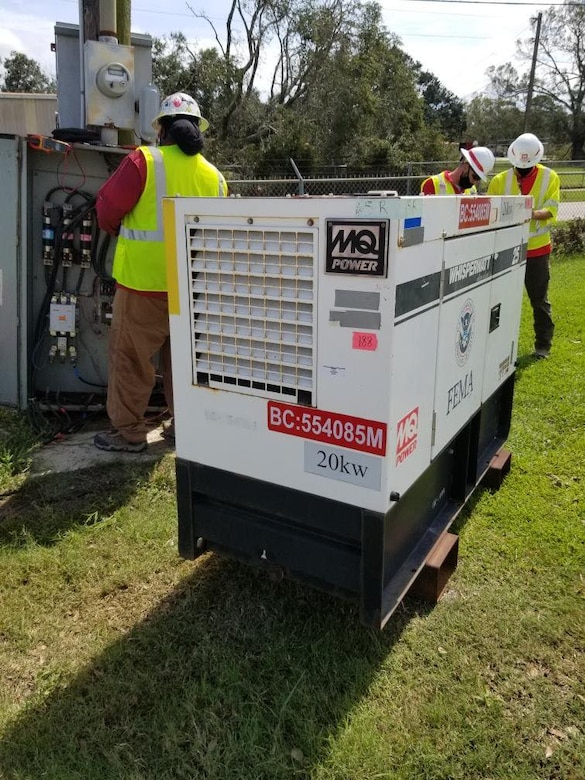 (IN THE PHOTO) U.S. Army Corps of Engineers Contractors install temporary generators at one of the sites requested by the state of Louisiana. Emergency power installation is one of the Corps’ primary missions during emergency recovery operations, in addition to supporting the temporary housing mission, providing temporary roofing and conducting infrastructure assessments. (USACE photos by Royalle Woods)