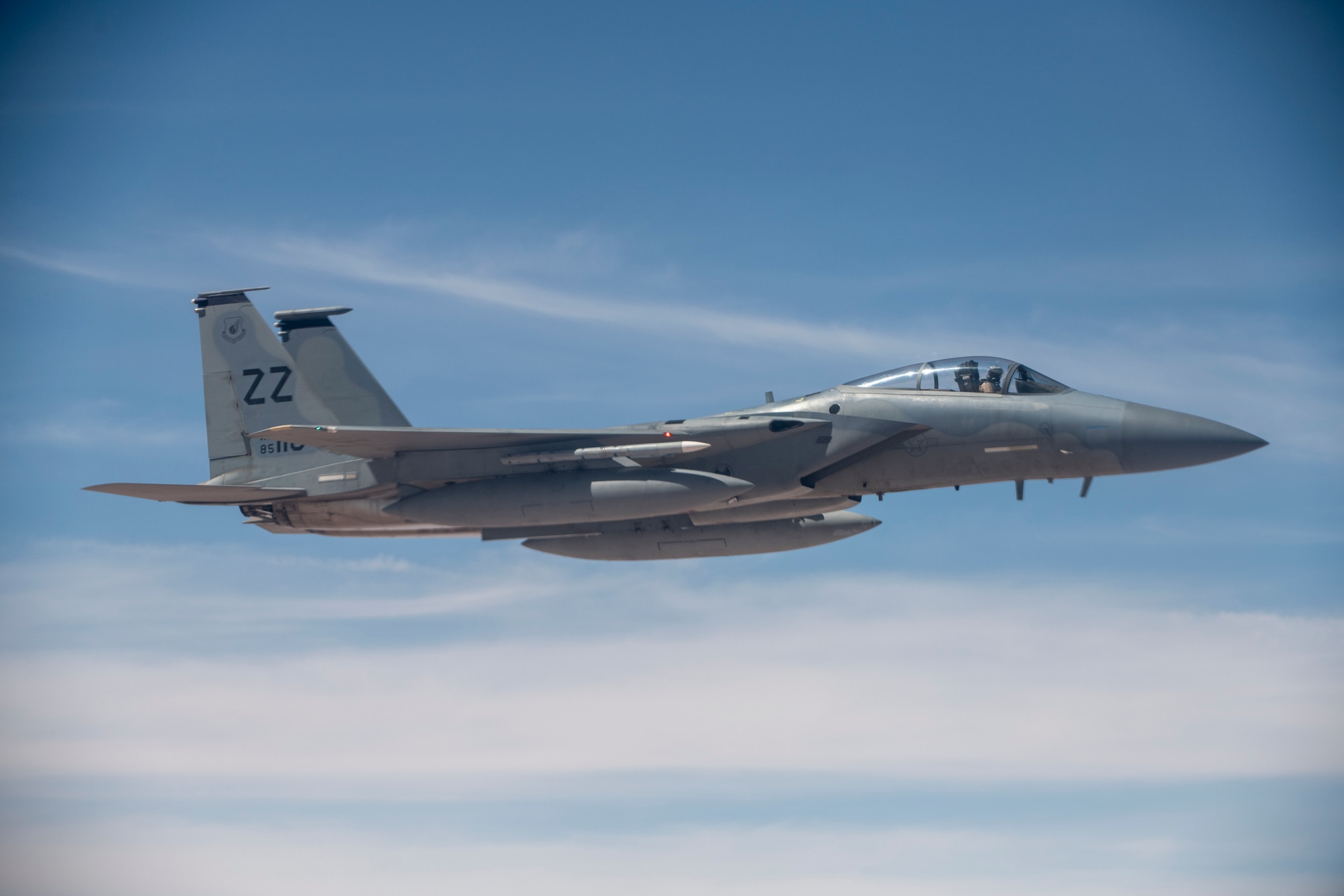 An F-15C Eagle from 44th Expeditionary Fighter Squadron, Prince Sultan Air Base, Kingdom of Saudi Arabia flies along a KC-10 Extender from the 908th Expeditionary Air Refueling Squadron during a large force employment at Al Dhafra Air Base, United Arab Emirates Aug. 25, 2020.