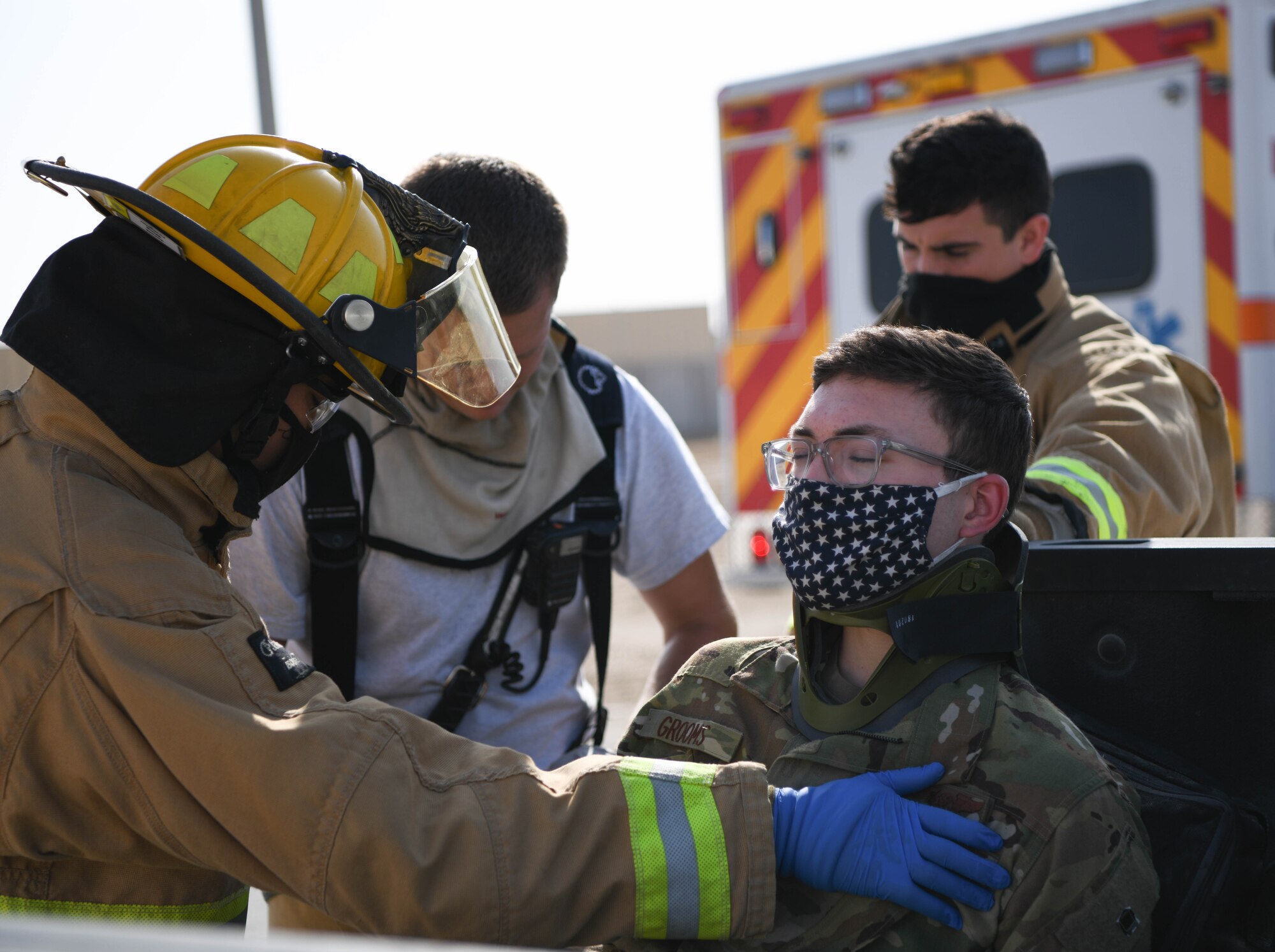 A firefighter from the 380th Expeditionary Civil Engineer Squadron checks on a victim during the Major Accident Response Exercise (MARE) September 3, 2020, at Al Dhafra Air Base, United Arab Emirates.