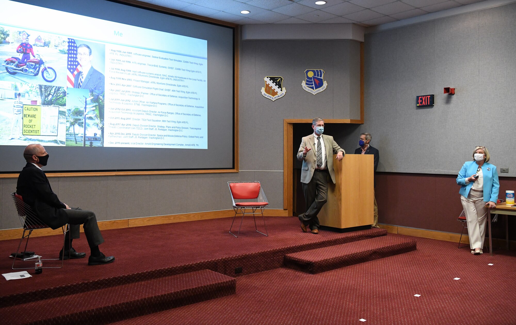 Jason Coker, center, Vice Director of Arnold Engineering Development Complex, speaks about his career path during a presentation to Air Force and National Aerospace Solutions, LLC (NAS) interns July 15, 2020, during a presentation about career development in the Main Auditorium at Arnold Air Force Base, Tenn. NAS is the Test Operations and Sustainment Contractor for AEDC. Also pictured are Dr. Rich Tighe, left, General Manager of NAS; Sarah Beth Morgan, right, Chief of Complex Support for AEDC; and Chris Crumbly, Technical Director for NAS. (U.S. Air Force photo by Jill Pickett)