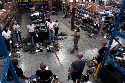 Airmen with the 81st Logistics Readiness Squadron help basic military training trainees from the 737th Training Wing Detachment 5 try on issued military clothing at the squadron’s warehouse at Keesler Air Force Base, Mississippi, Aug. 26, 2020. The squadron worked with different Air Education and Training Command units to support basic military training at Keesler by providing uniforms for trainees.