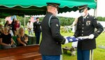 Members from Kentucky Army National Guard Honor Guard fold the U.S. flag during the repatriation of Cpl. Billie Joe Hash at Worley Cemetery, Corbin, Ky., Aug. 29, 2020. Hash was missing in action for almost 70 years.