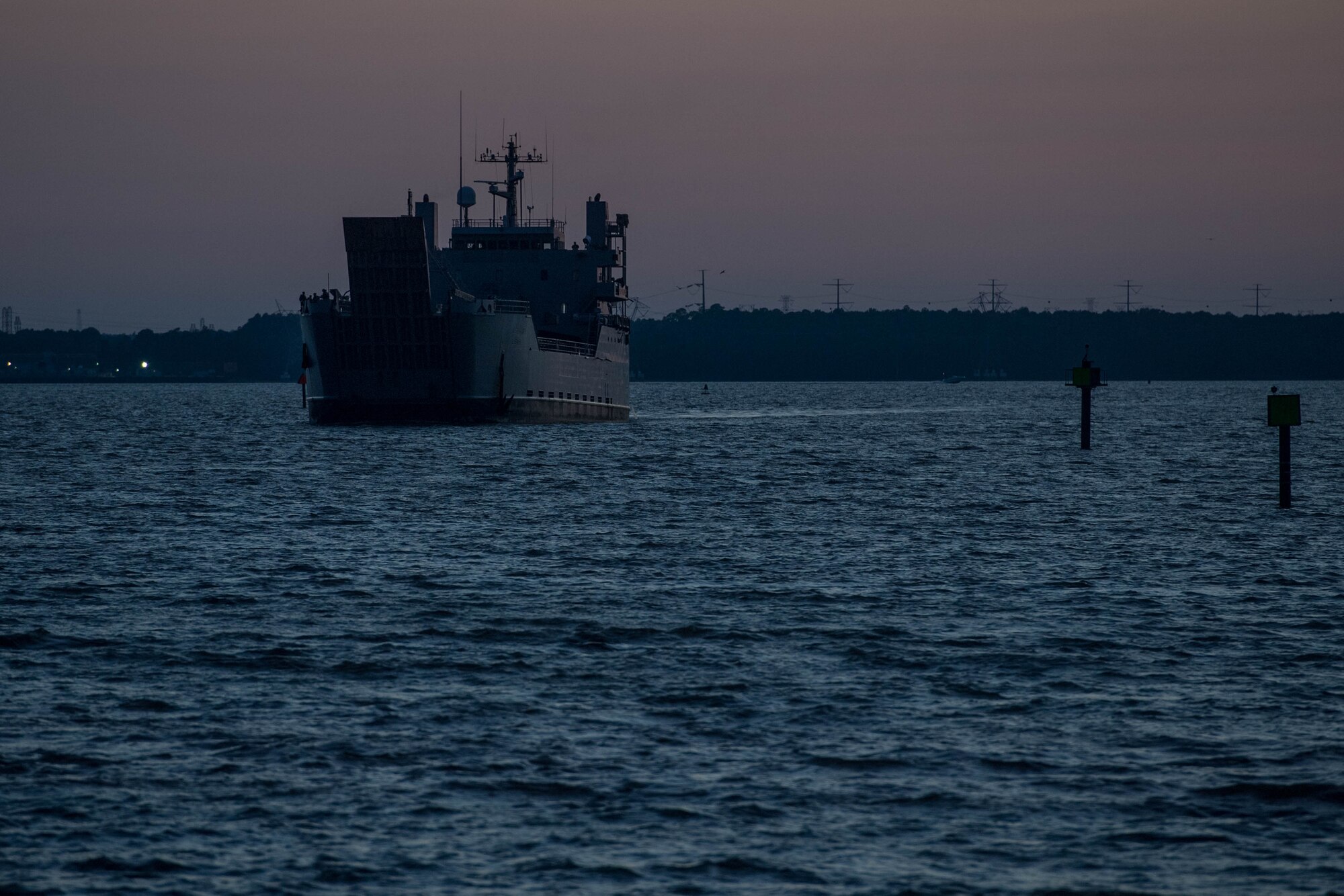 A ship sails toward Third Port.